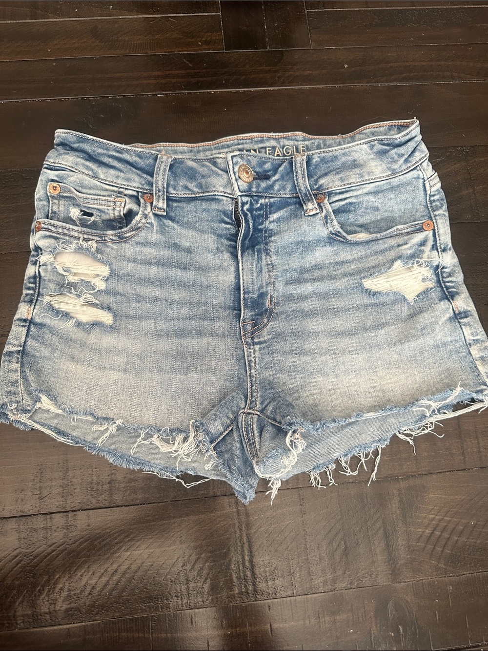 American Eagle Outfitters light wash distressed denim shorts